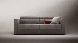 Sofa bed with adjustable headrests.