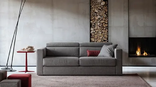 Grey sofa bed with headrest.